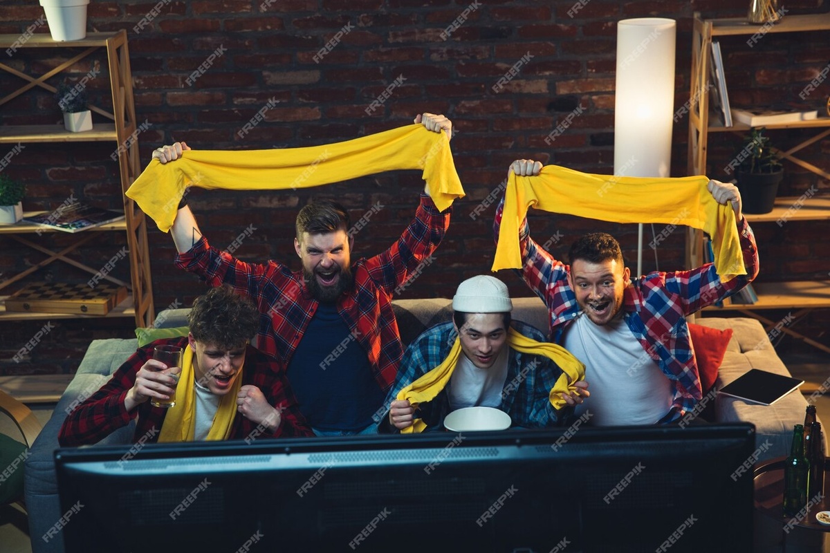 https://img.freepik.com/free-photo/group-friends-watching-tv-sport-match-together-emotional-fans-cheering-favourite-team-watching-exciting-football-concept-friendship-leisure-activity-emotions_155003-38769