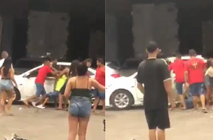 Grupo de pessoas agredindo o policial (Foto: Foto Reprodução)