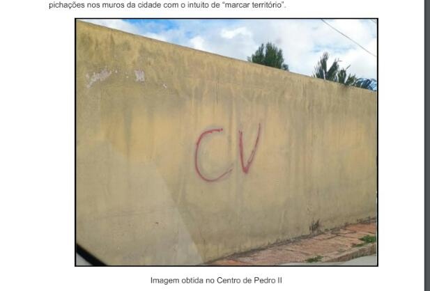 Pichação marcando área de dominio da facc~