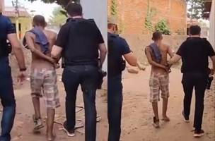 O suspeito sendo preso (Foto: Polícia Civil)
