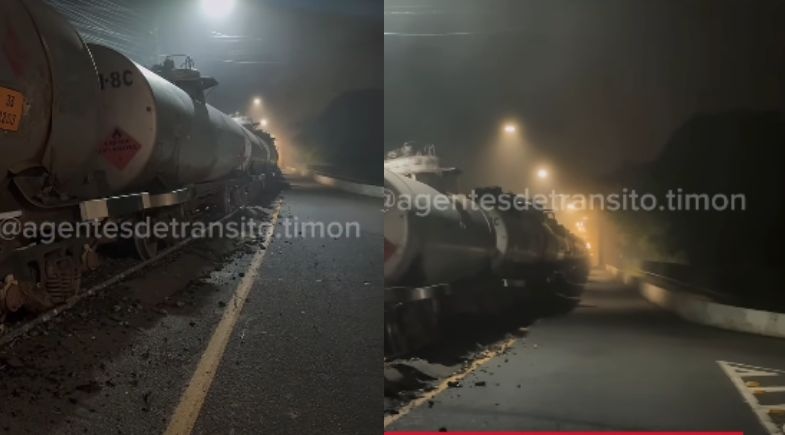 Trem cargueiro interdita ponte metálica